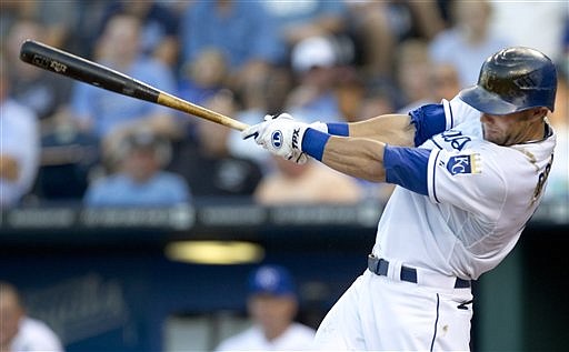 The Royals' Alex Gordon hits an RBI double off Indians starting pitcher Zach McAllister during the second inning Wednesday at Kauffman Stadium in Kansas City.
