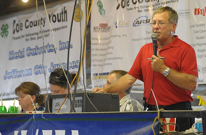 Bill Gratz was the auctioneer at the fair livestock auction on Wednesday. This is the 40th year Gratz has voluteered to be the auctioneer for this event.