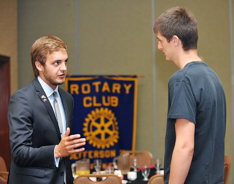 Matt Roudebush, left, visits with Connor Hulett after Wednesday morning's Jefferson City Breakfast Rotary Club meeting at Capitol Plaza Hotel. Roudebush spoke to the group about his year abroad in Cremona, Italy, as a foreign exchange student. Hulett, who is from the Lake Ozark area, will be spending the next year in the same town as Roudebush. He thanked the Rotarians for making the stay possible and what he learned about the people, culture and traditions, as well as what he learned about himself. 