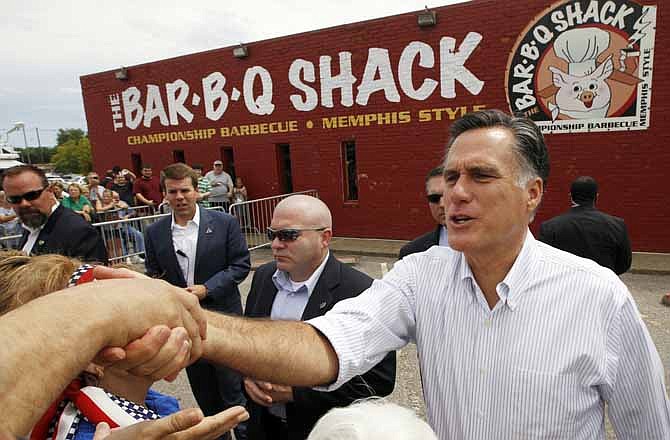 Republican presidential candidate and former Massachusetts Gov. Mitt Romney campaigns at Stepto's BBQ Shack in Evansville, Ind., Saturday, Aug. 4, 2012.