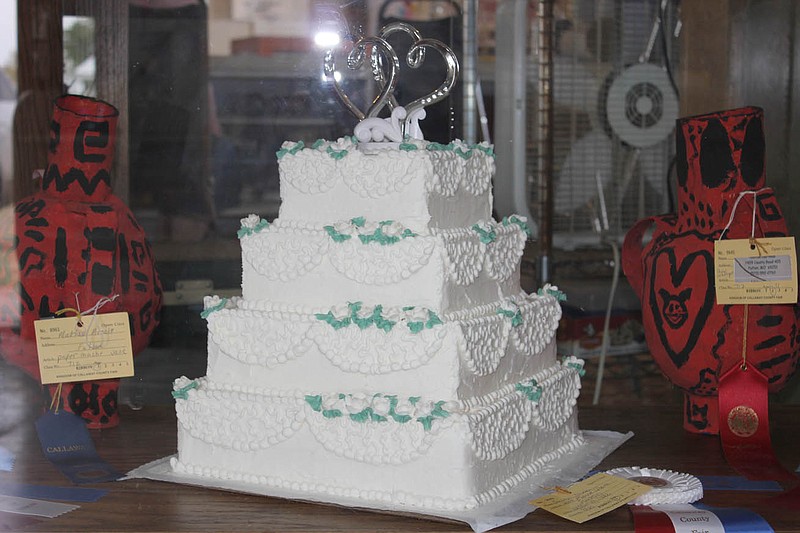 This wedding cake submitted to the open class by Susan Sheley, of Fulton, won a best of show ribbon at the Kingdom of Callaway County Fair.