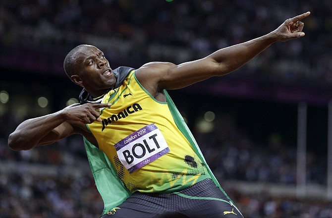 Usain Bolt of Jamaica celebrates after his win in the men's 100-meter final Sunday in London.