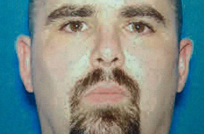 Shown is Wade Michael Page, a suspect in Sunday's Sikh temple shootings in Oak Creek, Wis.