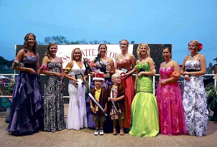 Caitlin Meyer was crowned the 2012 Miss Moniteau County Queen Tuesday, Aug. 7, at the main arena of the Moniteau County Fairgrounds, California. The court consisted of, from left, Meghan Halsey and Erin Cary, California; Amy Masterson, Clarksburg; Meyer, California; Suzanne Thompson, Tipton; Marla Dietzel, Jamestown; and Rachel Hoback and Meleigha Caudel, California.
Standing in front are newly crowned 2012 Little Mr. and Miss and Moniteau County Corbin Lawson, 4, and Addison Harris, 5. Corbin is the son of Brian and Becky Lawson, California. Addison is the daughter of Tim and Stephanie Harris, California.