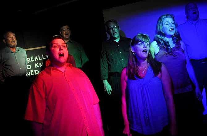 Cast members work on an ensemble song while rehearsing for the upcoming show, "All I Really Need To Know I Learned In Kindergarten" at Scene One Theatre. The show will mark the 50th production at Scene One's "Black Box Theatre" on High Street in downtown Jefferson City.