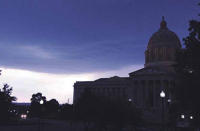 A storm approaches the Missouri Capitol late Wednesday evening.