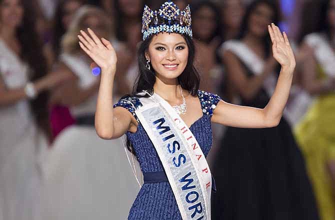 Newly crowned Miss World Yu Wenxia of China waves after she won the Miss World 2012 beauty pageant at the Ordos Stadium Arena in inner Mongolia, China Saturday, Aug. 18, 2012. 