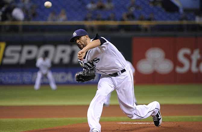 Tampa Bay Rays starting pitcher David Price delivers to the Kansas City Royals during the first inning of a baseball game, Tuesday, Aug. 21, 2012, in St. Petersburg, Fla. 