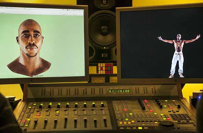 In this photo taken Tuesday, June 12, 2012, video images of the Tupac Shakur hologram are displayed on a computer monitor at the Subtractive Studio in Santa Monica, Calif. When Tupac Shakur rose from the stage in the California desert earlier this year, it was not only a jaw-dropping resurrection, but also the beginning of a new form of live entertainment.