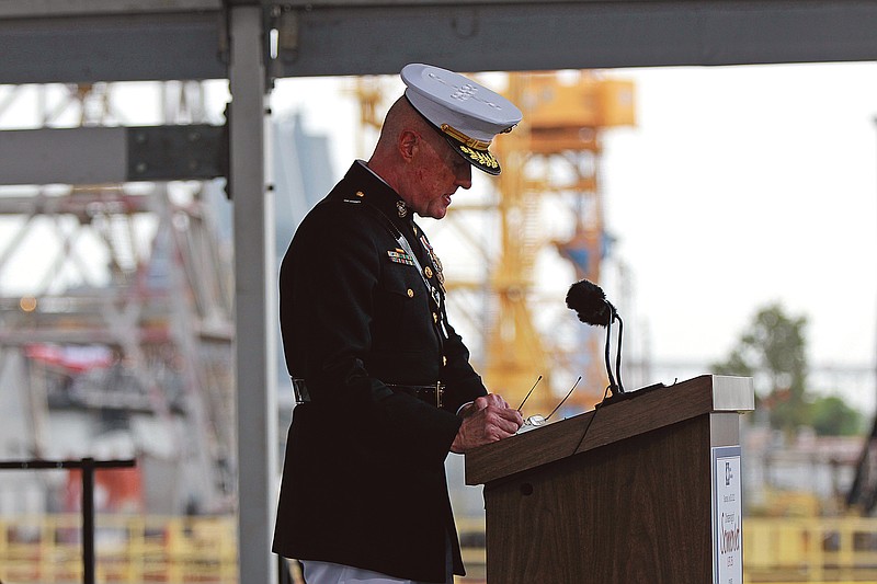 USMC Lt. Gen. Richard Mills speaks Saturday during christening ceremonies for the USS Somerset at the Huntington Ingalls Industries shipyard Shipyard in Avondale, La. The U.S. military has been launching cyberattacks against its opponents in Afghanistan, a senior officer said last week, making an unusually explicit acknowledgment of the oft-hidden world of electronic warfare.