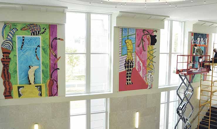 Overview of the three panels by artist Betty Woodman installed this week in the Christopher S. Bond U.S. Courthouse in Jefferson City. On the scaffolding at right are Ryan Brady, near, and Gordy Curtis, both from New York. Curtis is an art handler and has been installing Woodman's art for nearly 20 years. Woodman was selected to create the art and spent about three months creating the pieces and they were recently brought in to be put in place.