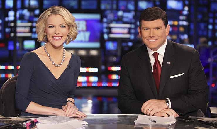 In a March 6, 2012 photo provided by Fox News, Fox News anchors Megyn Kelly and Bret Baier are seated at the anchor desk at the Fox New York Studios. Four years ago, Kelly roved the Democratic and Republican convention floors as a reporter for Fox. This week in Tampa, Fla., she's in Fox's booth as co-anchor with Bret Baier for the 2012 meetings.
