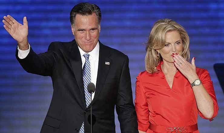 Ann Romney blows a kiss after being greeted by her husband Republican presidential nominee Mitt Romney on stage the Republican National Convention in Tampa, Fla. on Tuesday, Aug. 28, 2012. 