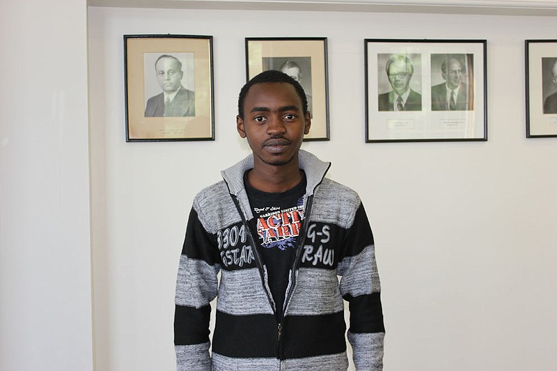 Steven Sakayroun poses in Reeves Library on Westminster College's campus Wednesday. A citizen of Central African Republic, Sakayroun is attending  the school for computer science, and believes education is an important step to changing the world.