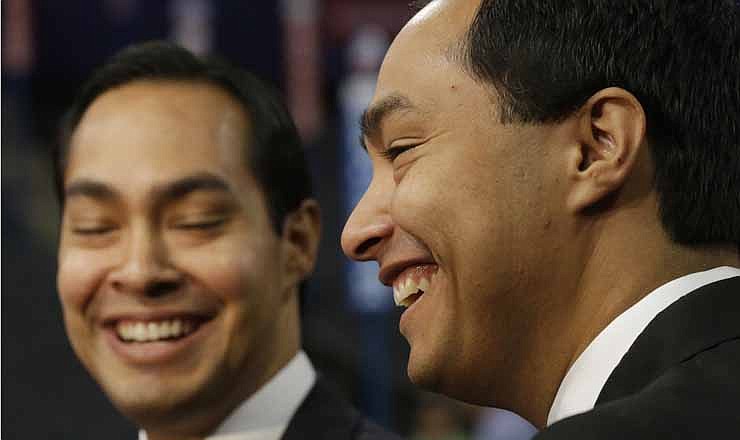 San Antonio Mayor Julian Castro, left, who will be the convention keynote speaker, and his twin brother, State Representative Joaquin Castro, who is running for U.S. Congress, are interviewed at the Democratic National Convention in Charlotte, N.C., Monday, Sept. 3, 2012.