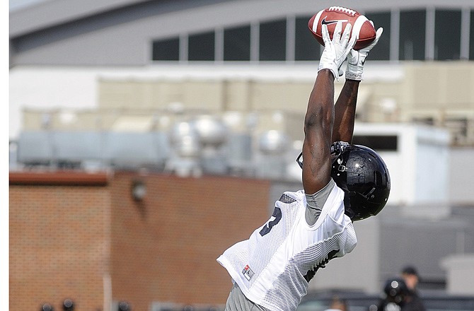 Dorial Green-Beckham goes up for a catch during practice last month in Columbia.