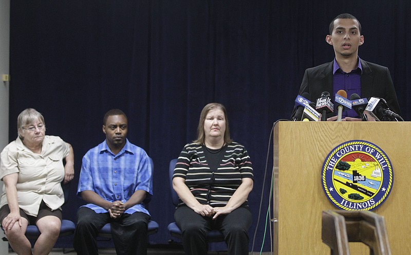 Members of the jury that heard the murder trial of former Bolingbrook police officer Drew Peterson from left, alternate juror Patricia Timke, 68; Jeremy Massey, 26; Teresa Mathews, 49; and jury forman Eduardo Saldana, 22, answer questions Friday during a news conference in Joliet, Ill.