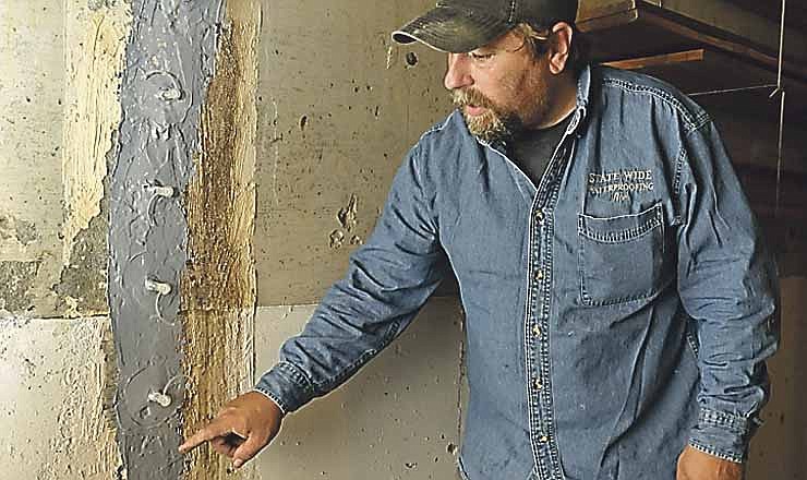 Ron Hollandsworth of State Wide Waterproofing talks about the process of filling and repairing a crack in a Jefferson City home's basement. The crack was caused by the summer drought and the movement of the dirt around the foundation.