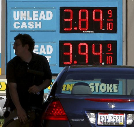 A man fills his gas tank Aug. 29 at a gas station in Lyndhurst, Ohio. After a hike for the last days of summer, prices should fall when stations begin selling cheaper winter grades.