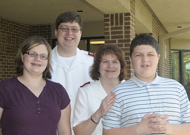 Salvation Army Maj. Bettie Cedervall, center, died unexpectedly Monday. She is survived by her husband, Maj. Kevin Cedarvall and their children, Christina and Johnathan. 