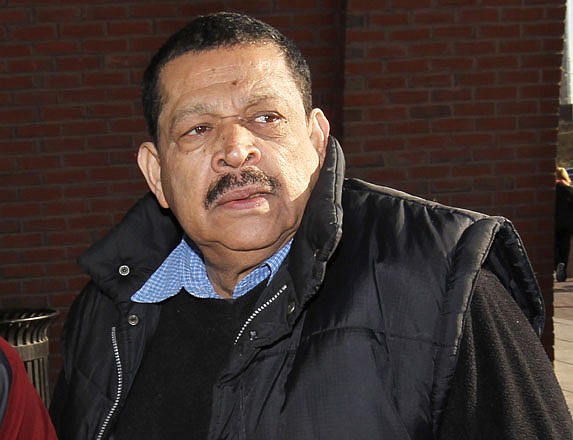 Inocente Orlando Montano, a former Salvadoran military officer, arrives at federal court in Boston on Dec. 19, 2011. Montano, accused of colluding in the 1989 slayings of six Jesuit priests, admitted Tuesday he lied to U.S. immigration officials, which puts him at risk for extradition to face prosecution in Spain.