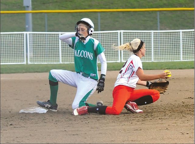 Madison Painter of the Jefferson City Lady Jays makes a play to record an out on Jolie Duffner of Blair Oaks during Thursday's game at the Falcon Athletic Complex.
