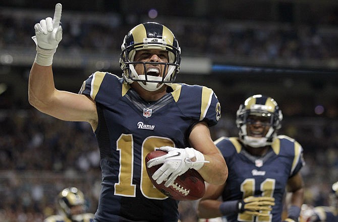Rams wide receiver Danny Amendola celebrates after catching a 1-yard touchdown pass as teammate Brandon Gibson looks on during the second quarter of Sunday's game against the Redskins in the Edward Jones Dome.