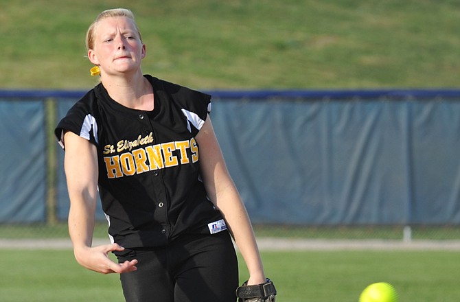 St. Elizabeth pitcher Erin Struemph delivers a pitch during Monday's game against Jefferson City at Lincoln Field. The Lady Hornets survived a marathon game, defeating the Lady Jays 2-1 in 12 innings. 