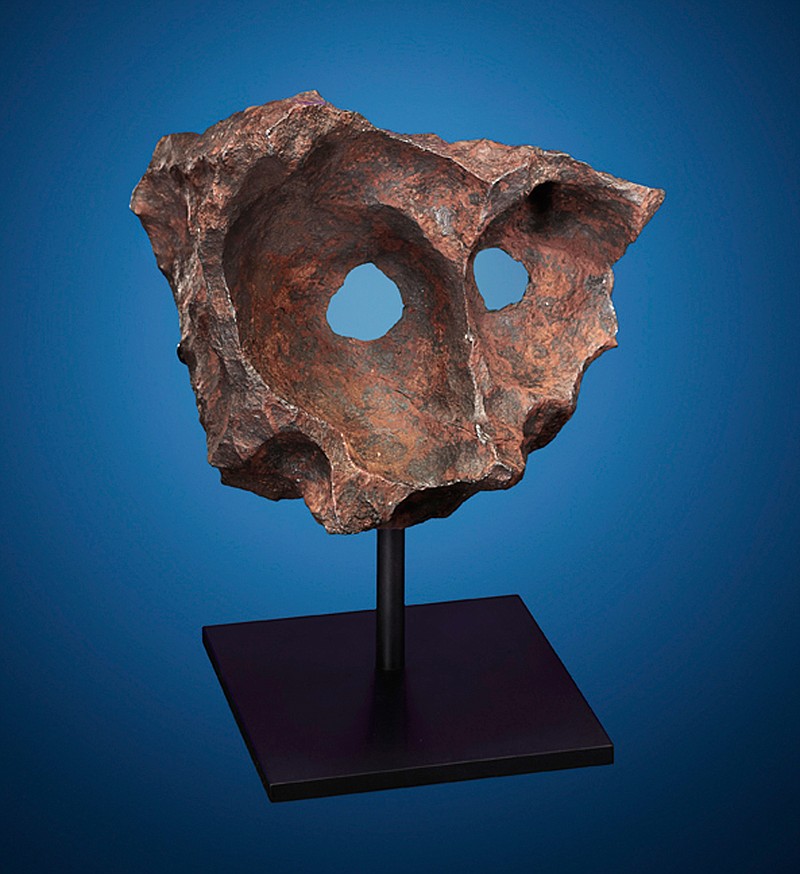 A naturally sculpted Gibeon iron meteorite was discovered by indigenous tribesmen in Namibia with a metal detector. It will be offered at a sale of more than 125 meteorites on Oct. 14 and is estimated to bring $140,000 to $180,000.