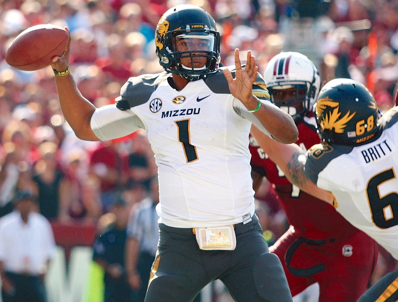 Missouri quarterback James Franklin reaches back to pass during the first half against South Carolina last Saturday at Williams-Brice Stadium in Columbia, S.C.