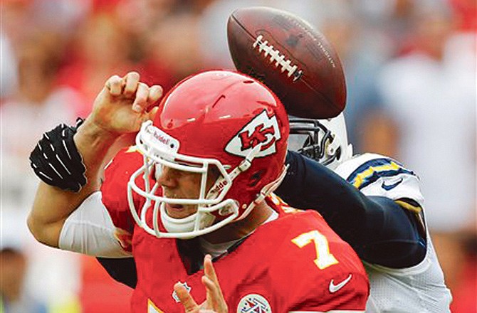 Chiefs quarterback Matt Cassel fumbles as he is hit by Chargers outside linebacker Shaun Phillips during Sunday's game at Arrowhead Stadium. The Chiefs had six turnovers in the loss.