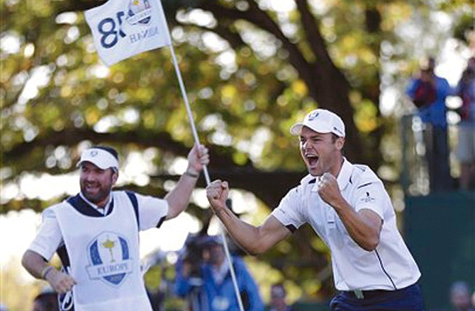 Martin Kaymer celebrates as Europe wins the Ryder Cup on Sunday at the Medinah Country Club in Medinah, Ill. The U.S. lost by one point.