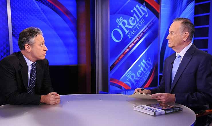  This Sept. 22, 2010 file photo shows Comedy Central's Jon Stewart from "The Daily Show with Jon Stewart," left, and and political pundit Bill O'Reilly during an interview for "The O'Reilly Factor" on FOX News Channel, in New York. 