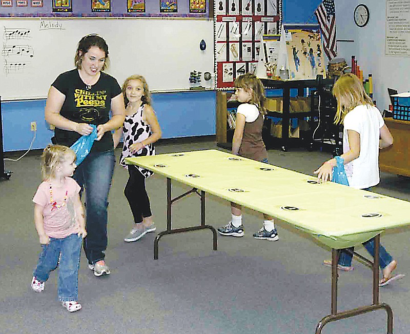 The Cookie Walk drew many to the elementary art music room at the California PTO Carnival on Saturday.  