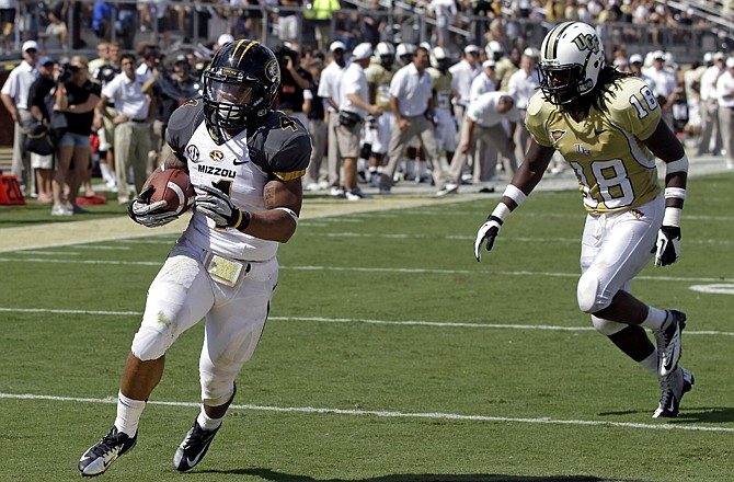 Missouri running back Kendial Lawrence breaks into the end zone during Missouri's 21-16 win against Central Florida on Saturday in Orlando, Fla. Lawrence had 18 carries in the second half of the game. 