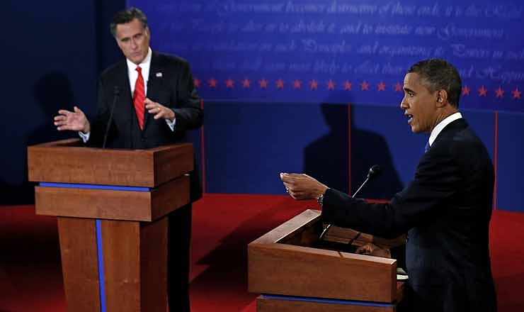 President Barack Obama and Republican presidential nominee Mitt Romney participate in the first presidential debate at the University of Denver, Wednesday, Oct. 3, 2012, in Denver. 