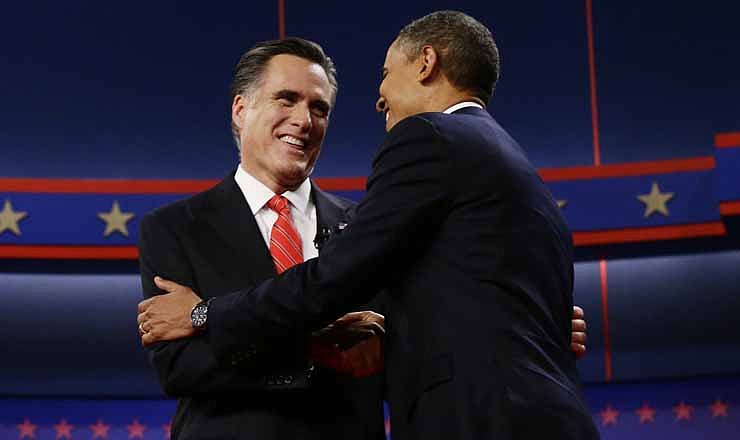 President Barack Obama and Republican presidential candidate and former Massachusetts Gov. Mitt Romney meet on stage at the start of the first presidential debate in Denver, Wednesday, Oct. 3, 2012. 