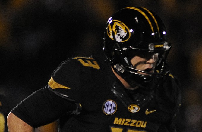 Missouri quarterback Corbin Berkstresser jogs across the field during the fourth quarter of Saturday night's game against Vanderbilt at Faurot Field.