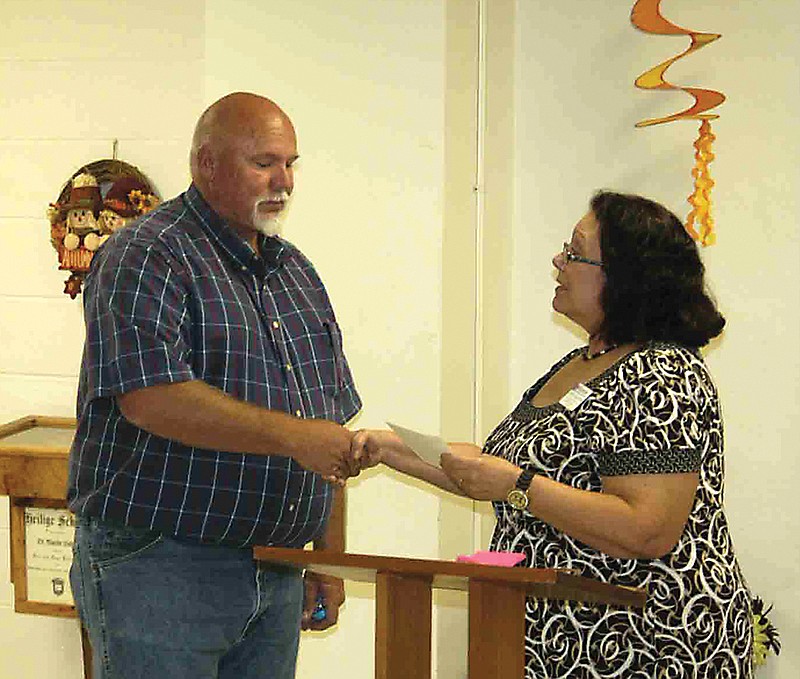 New California Kiwanis President Eugene Wickham is installed by District Lt. Gov. Diane Gollihugh Monday, Oct. 1.