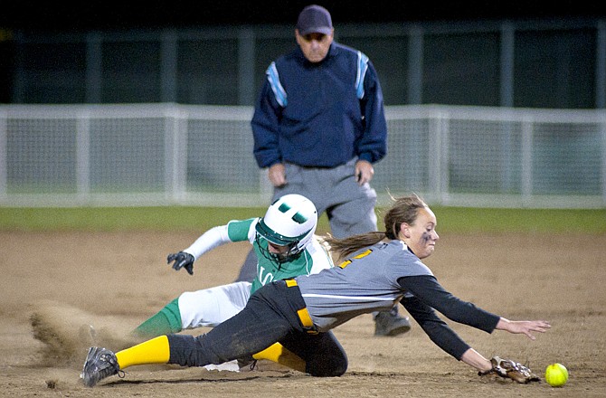 Blair Oak's Sara Jones is safe at second base as Sullivan's Aubrey Daniel reaches for the ball during their Class 3 sectional game Wednesday at the Falcon Athletic Complex.