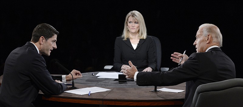Moderator Martha Raddatz watches as Vice President Joe Biden and Republican vice presidential nominee Rep. Paul Ryan of Wisconsin participate Thursday in the vice presidential debate at Centre College in Danville, Ky.
