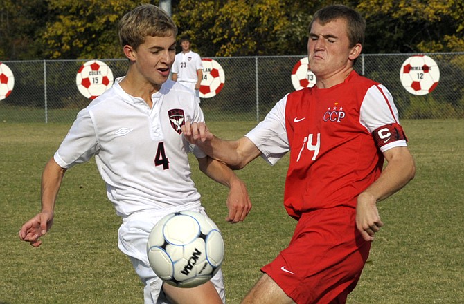 Jefferson City's Spencer Bone defends against Chaminade's Jason Pesek on Friday at the 179 Soccer Park in the Art Firley Shootout.