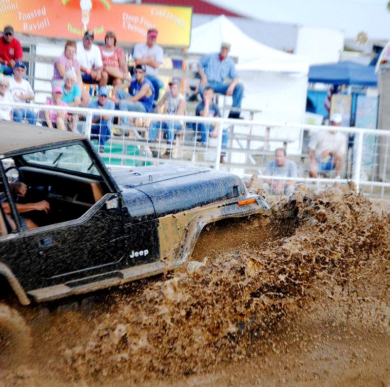 A Jeep competes during the Jaycees Mud Bog Race in 2012 at the Callaway County Fairgrounds. 