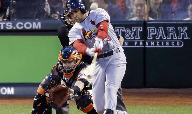 St. Louis Cardinals' Carlos Beltran hits a two-run home run during the fourth inning of Game 1 of baseball's National League championship series against the San Francisco Giants Sunday, Oct. 14, 2012, in San Francisco. 