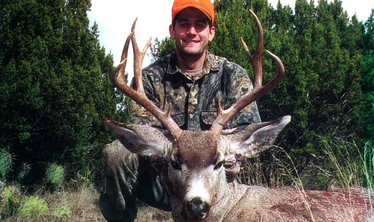 This undated photo provided by the Ryan family shows Paul Ryan, now vice presidential running mate to Republican Mitt Romney, after a hunt. Romney is on the good side of the National Rifle Association, which once had qualms about him, because he's opposing renewal of a federal ban on semiautomatic weapons, additional regulations on gun shows and suggested federal gun registration requirements.