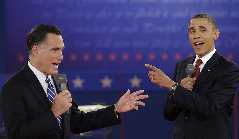 President Barack Obama and Republican presidential nominee Mitt Romney exchange views Tuesday during the second presidential debate at Hofstra University in Hempstead, N.Y.