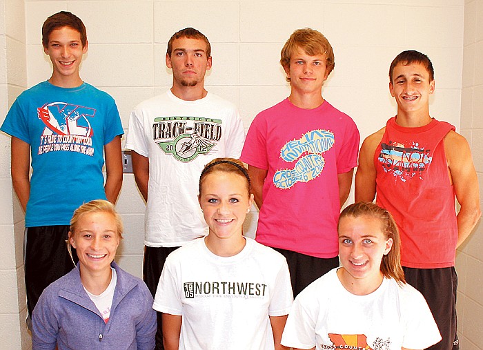 California High School varsity cross country athletes who were among the top 15 finishers at the Tri-County Conference Meet Thursday at Eldon to earn All-Conference honors, at left, front row, from left, are Lizzy Kirby, Katie Imhoff, Leah Korenberg; back row, Adam Burkett, Zach Merrill, Dakota Harris and Eli Freeman. Regan Downing was not present for the photo.