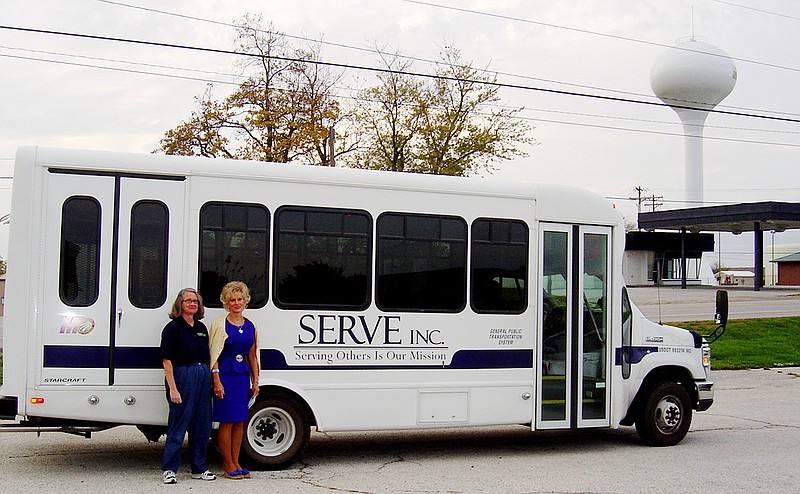 A new $49,707 bus has been added to the SERVE, Inc.'s 10-vehicle fleet used to provide passenger service to Callaway County residents. With the 20-passenger bus are, from left, driver Linda McVeigh and Patti Jo Peevy, SERVE's transportation director.                               