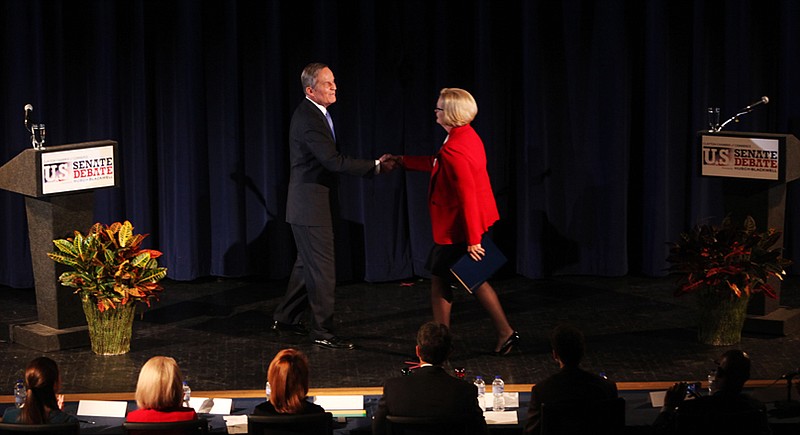 Republican Rep. Todd Akin and Democratic Sen. Claire McCaskill shake hands Thursday before the start of the second debate in the Missouri Senate race. 