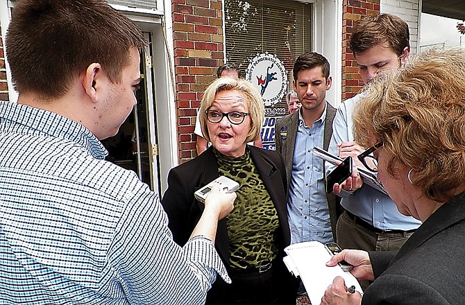 Sen. Claire McCaskill, D-Mo. meets with the media after speaking to supporters at a campaign stop in Festus. McCaskill called challenger Todd Akin's analogy comparing her to a "dog" that fetches headaches in Washington and brings them back to Missouri "unfortunate."